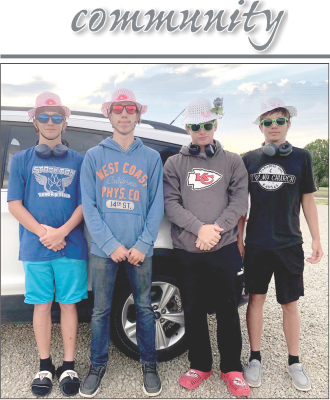 THEYOUNG MEN who attended the Wheat State Retreat Center Camp in June were (from left) Vince Thayer, Jackson Young, Isaac Thayer, and Benjamin Wasson.