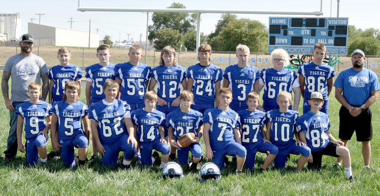 MEMBERS OF THE 2022 STOCKTON JUNIOR HIGH FOOTBALL TEAM are kneeling, from left: Jace Kesler, Dayton Carpenter, Joseph Cockrell, Lucas Earl, Calder Elmer, Zachary Chandler, Titus Ferguson, Vince Thayer, Beckem Hilbrink (manager); and standing, from left: Spencer Hilbrink (head coach), Skyler Turnbull, DJ Ard, Damon Muir, Tanner Inglsbee, Lincoln Keller, Isaac Thayer, Tanner Post, Landon Roenne and Heath Muir (assistant coach). Not pictured is Treyvin Horn (manager).