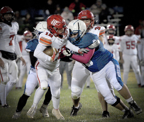 Cason Iwanski (partially hidden) and Jaxon Dunlap vs. Hill City