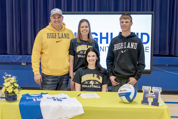SIGNING A LETTER OF INTENT to play volleyball at Highland Community College was Audrey Kesler. Her family members in attendance at the March 28 event were: Zach, Jen and Jace Kesler.