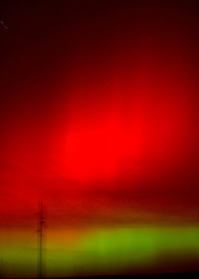 THE NORTHERN LIGHTS, also known as Aurora Borealis, danced gracefully in the sky just north of Stockton on Pine Street, where this picture was taken. The colored waves cast a celestial glow over the landscape last week on Tuesday and Wednesday evenings. (Photo courtesy of Delwin LaRue.)