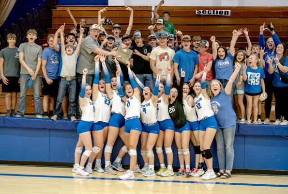 THE STOCKTON LADY TIGERS celebrate their Regional Championship with several of their fans following the Lady Tigers’ wins over Lakeside and Ellis last Tuesday in Stockton. Team members pictured are front row, from left: Katlyn Couse, Brin Muir, Aubrey Kesler, Ava Dix, Bodye Stithem, Ashlyn Hahn, Saj Snyder, Teagann Shamburg, Meredith Gasper, and Brenna Odle.