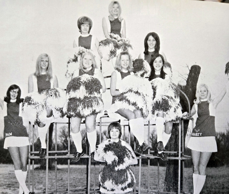 THE SHS POM PON GIRLS showed spirit with a beat in 1972! Pictured are (front row, from left) Pam Wall, Tina Rogers, Marty Currie; (second row) Mendy Baughman, Candy Spencer, Jo Desbien, Kathy Smith; (third row) Connie Poore, Katy Laska; and (top of the pyramid) Sara Marshall.