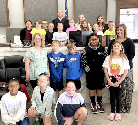 MRS. MARTHA FLECK’S FOURTH GRADE STUDENTS held a mock trial at the Rooks County Courthouse on Monday, September 23rd. Pictured are (from left on floor): Treveah Clark, Penelope Chandler, Kaisyn Muir; (standing) Trisha Kriley, Ira Beall, Cohen Muir, Kaiden Fast, Abby Terry, Lindsey Mongeau; (third row) Cambry Glendening, Karson Kuhlmann, Norah Muir, Emery Peterson, Joree Dibble, Sophia Hansen, Kynlee Collins, Kirby Cline; (back row) Wyatt Barber, Judge Bigge, Jamie White, and Danielle Muir.