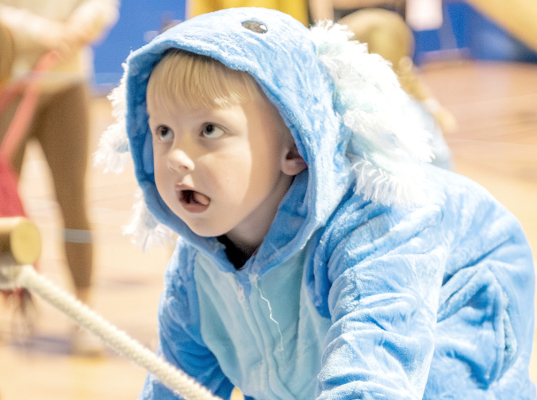 FOCUSED! Landrin Leake focuses on the task at hand while climbing the swinging ladder at Goblin’s Glory.