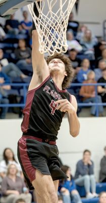 Plainville Cardinal Sophomore Davyn Willeford dunking vs Stockton.