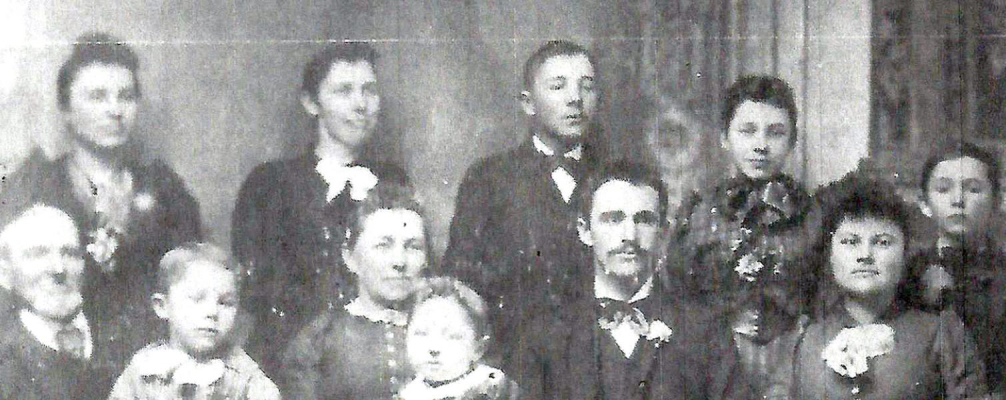 THE WILLIAM B. HOAR FAMILY in the 1890s. Back row, left to right: Cora, Arminta, Oscar, Louesa and William. Front row, left to right: William (Bramble) holding Henry, Mary holding Mary, Charles and Margaret.