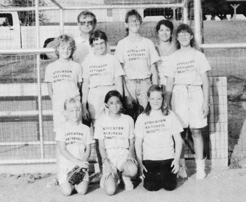 THE STOCKTON NATIONAL BANK was the sponsor of the 1989 Girls Softball Team No. 1. Pictured are (front row, from left) Alicia Rothe, Sandy Cocoran, Rachel Gager; (middle row) Misty Bice, Angie Mackley, Casey Maddy, Shawna Bellerive; (back row) coaches Joey Bellerive and Joni Bellerive. Not pictured were team members Tessie Jenkins, Bridget Weiser, and Robin McNeely.