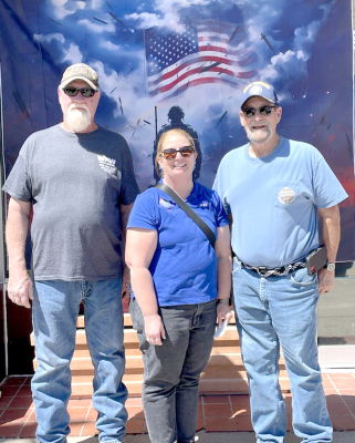 VETERANS JIM ROGERS, Jennie Niblock with Kansas Honor Flight, and Delwin LaRue are pictured. The two men will make the Kansas Honor Flight this year because of the donations raised during the Plainville Red Line Cruisers Car Club’s annual Cruise Night and Car Show.