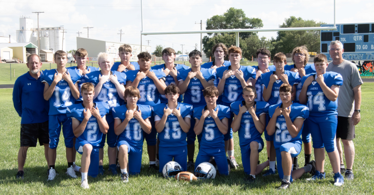 The 2025 SHS FOOTBALL TEAM members are, front row, from left: Jace Kesler, Dayton Carpenter, Kelsie St. Clair (manager), Cameron Balthazor, Ashton Nuss, and Lincoln Keller; standing, from left: Coach Justin Basart, Kolt Kuhlmann, Haden Hahn, Tanner Post, Damon Muir, Sean Green, Dalton Ard, Jaydan Arellano, Wesley Toll, Ezekial Garcia, Justice Stice, Titus Ferguson, Bentley Neilson, Garrison Mongeau and Coach Anthony Cole.