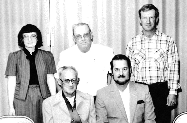 RECOGNIZED for their 20 years of service as Rooks County employees in 1989 were (seated, from left): John Maupin, Ronnie strutt; (back row, from left) Cherrilin Sprick, Gerald Rolfe, and James Cooper.