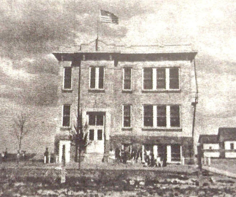 THE SMOKY HILL SCHOOL, built in 1920, was constructed by parents who voluntarily came together to build this three-story concrete structure for the children in the area. Sue McFarland attended this country school as a first grader.