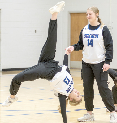 SENIOR STRIDERS Karleigh Horn (#14) and Saj Snyder (#13) perform with their group during halftime of the Stockton vs. Lincoln boys basketball game held in Stockton on February 3.