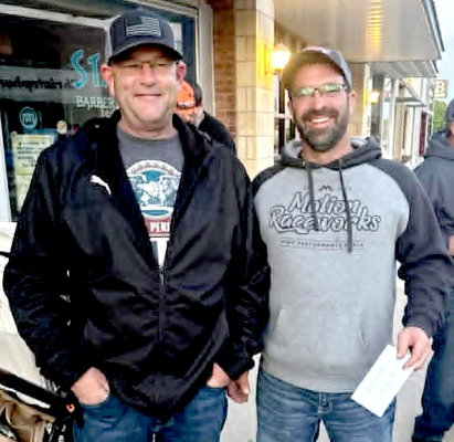 FIRST-PLACE WINNER—Jameson Mick with Club Member Preston Gosselin (left)