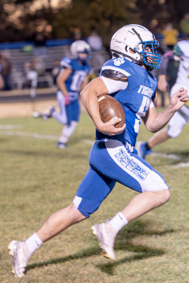 Emerson Lowry runs for a TD vs. St. Francis HS