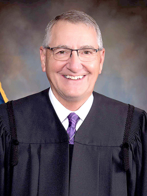 District Magistrate Judge Richard Flax