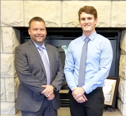 DR. BRIAN BRIGGEMAN, ACCC Director and KSU AGEC Professor, and Jalen Tucker (right) at the K-State Department of Agricultural Economics Awards Banquet, September 17, 2021.