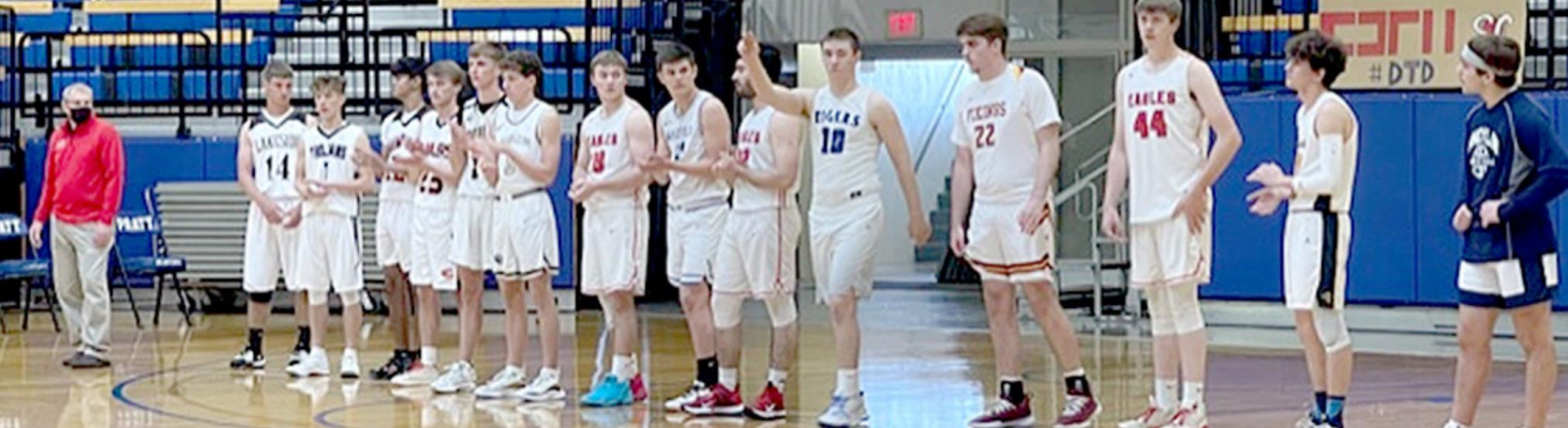 STOCKTON SENIOR ETHAN MEANS waves to the crowd as he is introduced during the all-star game in Pratt. Ethan was one of 30 boys chosen to play in the game. (Photo courtesy of Jennifer Hrabe)