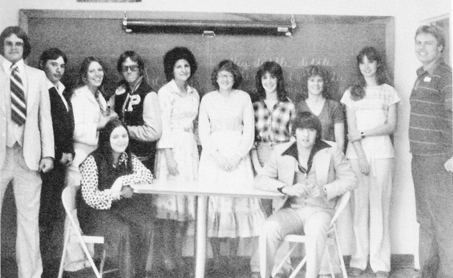 THE PLAINVILLE HIGH SCHOOL STUDENTS who qualified for the State Forensics Competition in 1979 were Janice Jones, Doran Zeigler, Pat Hageman, Elena Glendening, and Jeff Wheatley. Pictured are the Forensics team (seated at table, from left) Janice Jones and Jeff Wheatley; (standing left to right) Paul Simpson, Doran Zeigler, Madeline Hrabe, Pat Hageman, Elgeana Glendening, Megan One, Deb Stagner, Mary Wilson, Karen Seaman, and Bryan Russell.