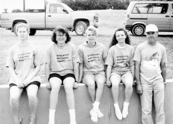 MEMBERS OF THE 18-AND-UNDER GIRLS FAST-PITCH TEAM IN 1991 were (from left) Richelle Haines, Tami LaRue, Mindy Towns, Mandy Berland, and coach Jimmy Jackson. Not present for the picture were Shelly Steeples, Shannon Steeples, Heidi Farris, Beth Bigge, Angie Johnston, and Missy Hollern.