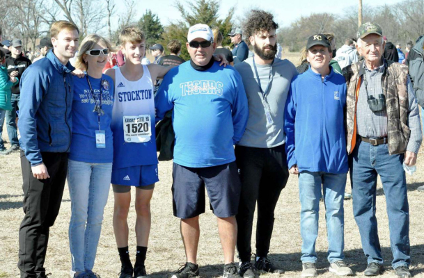 ALL IN THE FAMILY! Jonathan Hamel had a great supporting cast cheering him on at the state cross country meet held in Victoria last Saturday. Hamel, a freshman, finished in 13th place, earning a medal for his accomplishment. From left are: Christian Hamel (brother), Christina Hamel (mother), Jonathan, Scott Hamel (father), Ethan Hamel (brother), Mark Hamel (uncle) and Dennis Hamel (grandfather).
