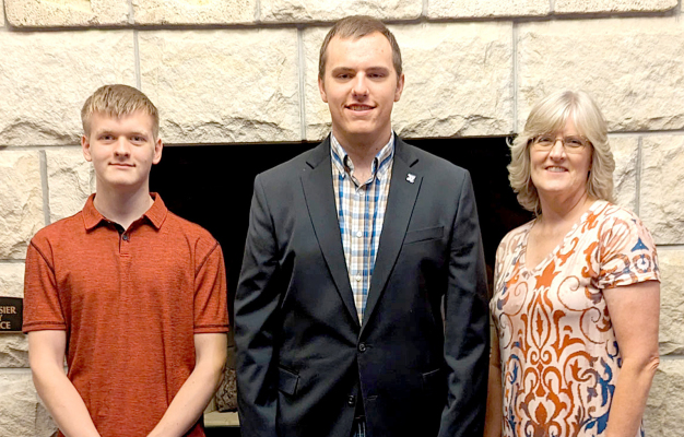LUKE VOSS, Jarek Meyer and Heather Stamper-Voss at the K-State Department of Agricultural Economics Awards Banquet, September 22, 2023.