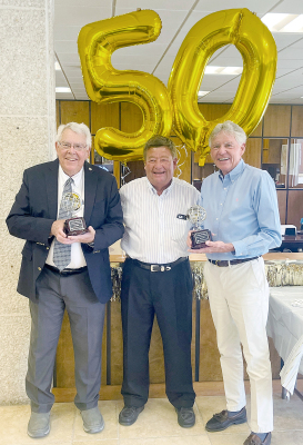 COMMERCE BANK representative Steve Hallier presented John (left) and James Berkley with their 50 years in banking awards on Monday, August 15th. John began his banking career in December 1971 after graduating from Kansas University that same month. He retired as bank president on April 1st, 2007. James began his banking career in 1972 after getting his BS in business from Kansas University. He retired as bank chairman in February of 2016.