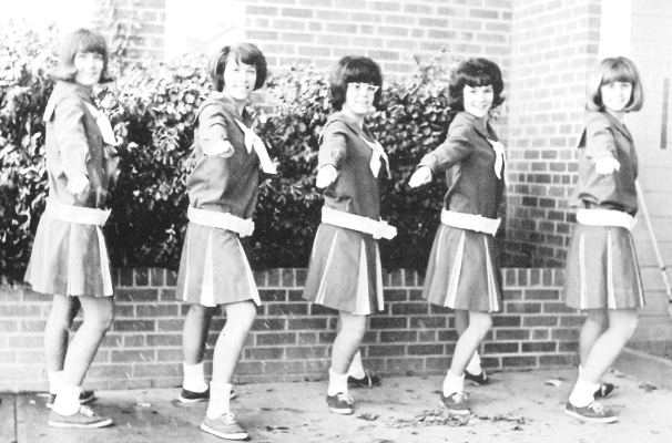 THE 1966 PLAINVILLE HIGH SCHOOL A TEAM cheerleaders were (from left) Julie Smrcka, Barbara Harrison, Cindy Hammonds (head), Cathy Cussen, and Suzy Weir. Under the guidance of President Dianne Harrison, the Pep Club and cheerleaders cheered the Cards on at all games. The Pep Club also sponsored the Sno Ball, using “Silver Bells” as their theme.