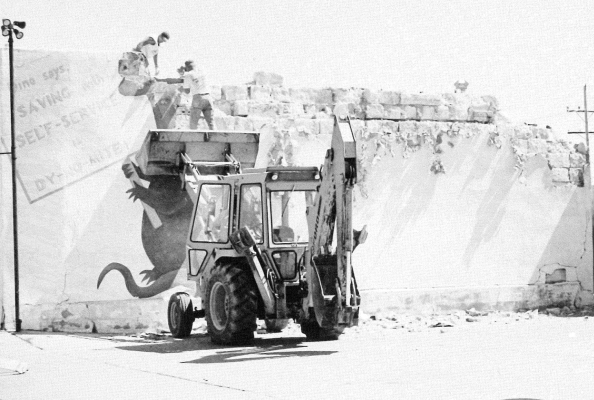 THE VIEW from the Dino Discount parking lot was never to be the same after the west wall of what had been Dr. Muck’s optometrist office was razed in the summer of 1997. The big green dinosaur, which had been painted on the wall, was no longer to be a landmark for the area. Pizza Hut was refurbishing the building at 309 Main for a restaurant.