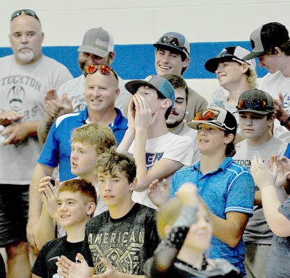 SHS Football players cheering at the Back-To-School Bash