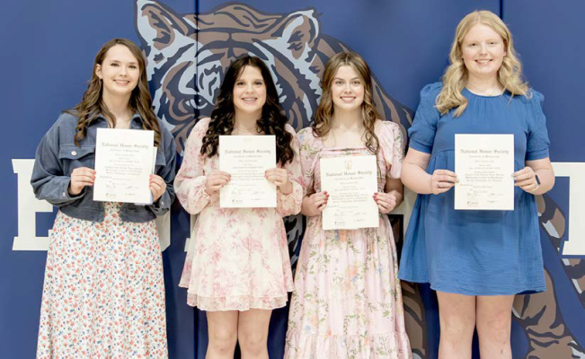 SHAEYOHON, Mia Odle, Camille Lowry, and Brenna Odle are the new Stockton High School National Honor Society inductees. The ceremony was held on Monday, March 31.