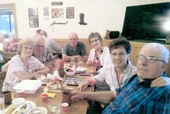 CHEERS TO MANY YEARS OF FRIENDSHIP! Lana and Larry Odle, Jimmy and Pattie Jackson, and Rita and Del Sander have made many memories, and shared much laughter through the years. This happened to be one of those times when they gathered at Rooks County Country Club to enjoy each other’s company. (Courtesy Photo)