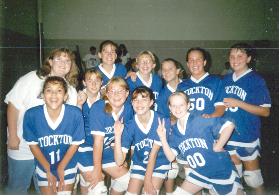 THE STOCKTON SEVENTH-GRADE VOLLEYBALL TEAM had just beaten Smith Center in the fall of 1999, and took a picture to commemorate the win! Pictured are (front row) Kenzie Green, Erin Thornburg, Whitney Hostetler, Nikki Campbell; (back row) Nellie Byfield, Jenny Knoll, Alli Baughman, Missy Thayer, Bethany Dix, Lindsey Crandall, and Sadie Laska.