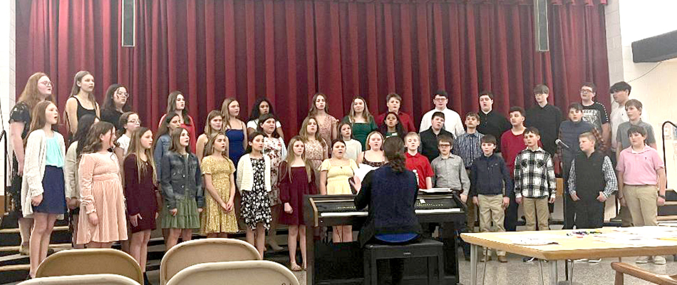 THE STOCKTON JUNIOR HIGH CHOIR received a I Rating for the two numbers they performed at the Pike Trails League Junior High Music Festival on Monday, March 3rd. Every performance from the Stockton music students received a I or I+ Rating.