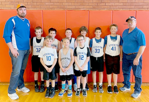 THE STOCKTON RECREATION COMMISSION’S 5th-Grade Boys Basketball Team members include front row, from left: Lane Muir, Grayson Mongeau, Hudson Kriley; and back row: Coach Jesse Prockish, Kobi Earl, Quinton Trevino, Garrison Mongeau, Jace Pfeifer, Vincent Antonini, Hudson Muir, and Coach Roger Hessler. (Photo courtesy of SRC)