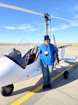 CHRISTINE TOEVS stands by her gyroplane, ARTE, at the 2024 Kansas Aviation Tour held at the Rooks County Regional Airport on Friday, September 27th. Students from around the county enjoyed the day on the runway.