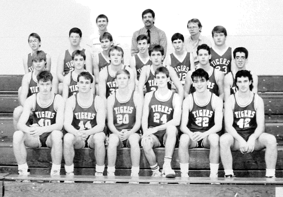 PICTURED are members of the 1988-89 Stockton High School Boys Basketball Squad. Front row, from left: Derrick Tripe, Shane Sammons, Richard Dix, Steve Reed, Travis Harrison, Wade McDowell; (second row) Dan Kuhlmann, Jason Miller, Doug Keller, Brian Johnston, Dan Melton, Phillip Chesney; (third row) Kelly Muir, Martin Kollman, Dennis Kuhlmann, Duane Smith, Eric Schroeder, John Conger; (back row) assistant coach Phil Wilson, head coach Richard Bechard and manager Bill Walker.