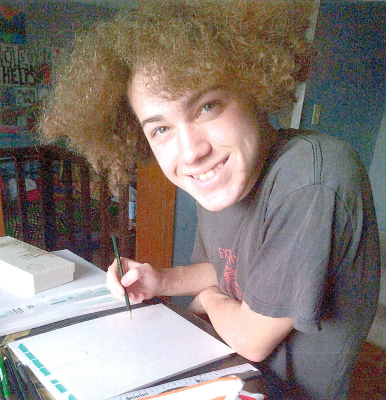 ADAM BALLARD enjoyed drawing new creatures while waiting to start Game Night at the Rooks County Historical Museum. Some of his artwork is on display in the Museum’s