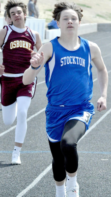 HUNTER HOWELL wins his second gold medal of the day, this one in the 200 Meter Dash, at the Stockton Invitational.