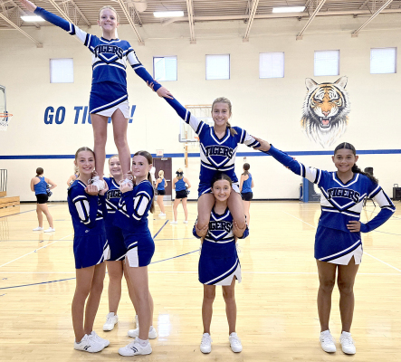 THE 2024 SJH TIGER CHEER members are from left: Addison Dix, Hadlee Sterling, Brooklyn Couse, Corbyn Glendening, and Adrienne McCoy; and flyers, Remy Muir and Harper Lowry.