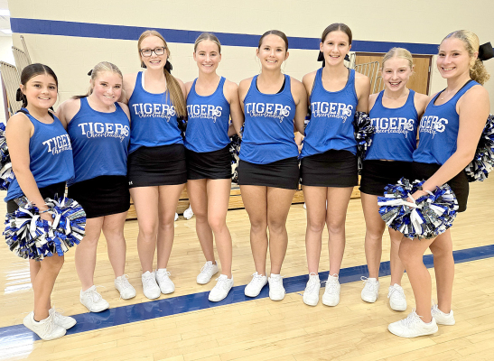 READY TO CHEER on the Tigers throughout the 2024-2025 school year are high school cheerleaders (from left) Serenity Carpenter, Aidyen Kerr, Ella Snyder, Ava Dix, Shae Yohon, Meredith Gasper, Saj Snyder, and Temprance Northup.