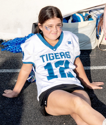 FRESHMAN SERENITY CARPENTER relaxes for a bit prior to the Homecoming festivities on Friday night at Tiger Stadium.