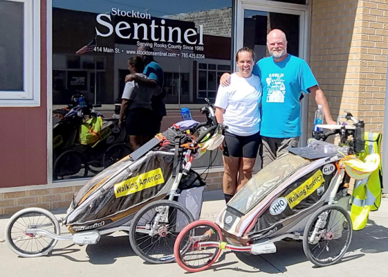 ERIN DIETRICH AND CHRIS REA stopped in at the Sentinel office Friday afternoon, and we enjoyed a delightful visit. The couple, from Bloomington, Minnesota, is now at the halfway point of their walk across America, from Delaware to California.