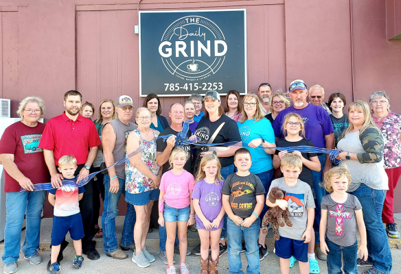 THE GRAND OPENING AND RIBBON CUTTING
