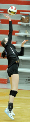 CAPPI HOETING spikes the ball during action on October 6 between Stockton and Hill City.