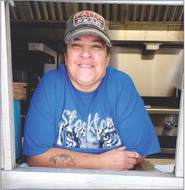 SUSIE WOODARD is ready to serve you up a fresh, hot burger with a side of fries at her food trailer, Susie Q’s, located on Highway 183 in Stockton.