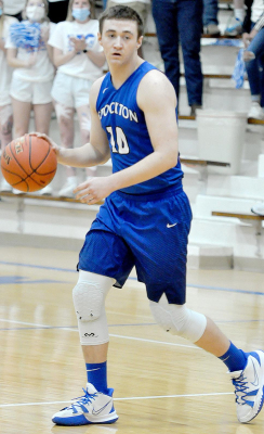 STOCKTON SENIOR ETHAN MEANS surveys the court during the Tigers’ game against Ness City in the quarterfinals of the Class 1A, Div. 1 State Basketball Tournament.