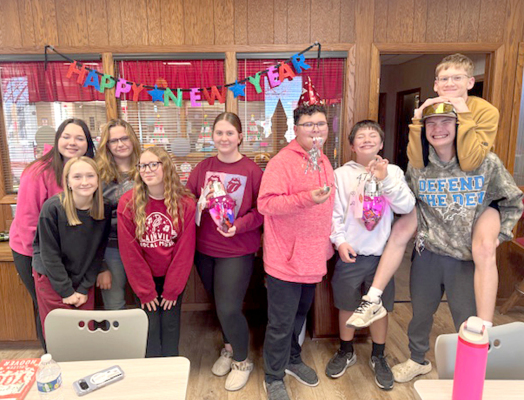 THE PLAINVILLE MEMORIAL LIBRARY celebrated the last day of 2025 with a junior high/ high school UNO tournament. Getting in on the action were (front row) London Waggoner, Aniya Hays; (back row) Sidney Littrell, Elle Plante, Layla Williams, Liam Balthazor, Carter Stevens, Eli Molina, and Rowen Wyatt (on shoulders).
