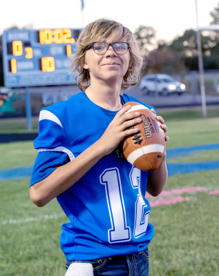 RATHERTHAN BEING suited up for the game, Stockton freshman Bentley Neilson’s role last Friday night was to provide the footballs to the referees during the Tigers’ matchup with Hill City.