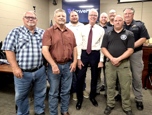 ON HAND FOR THE PRESENTATION of the Rooks County Sheriff’s Office’s new Virtual Reality Training Simulator were (front row, from left) Rooks County Commissioner Tim Berland, Rooks County Commissioner John Ruder, U. S. Senator Jerry Moran, Osborne County Deputy Marcus Betzold; (back row) Rooks County Commissioner Jake Prockish, Rooks County Deputy Tyler Williams, Rooks County Deputy James Balthazor, and Rooks County Sheriff Gary Knight.